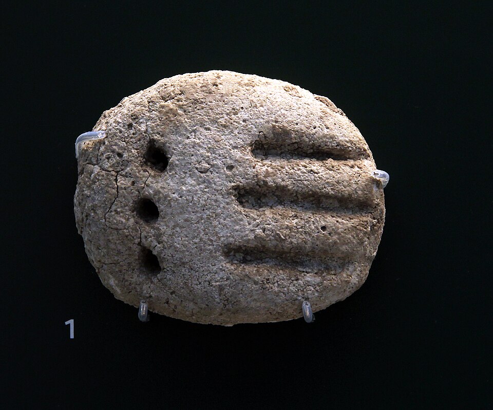 Tábua de gesso com números arcaicos do período de Uruk